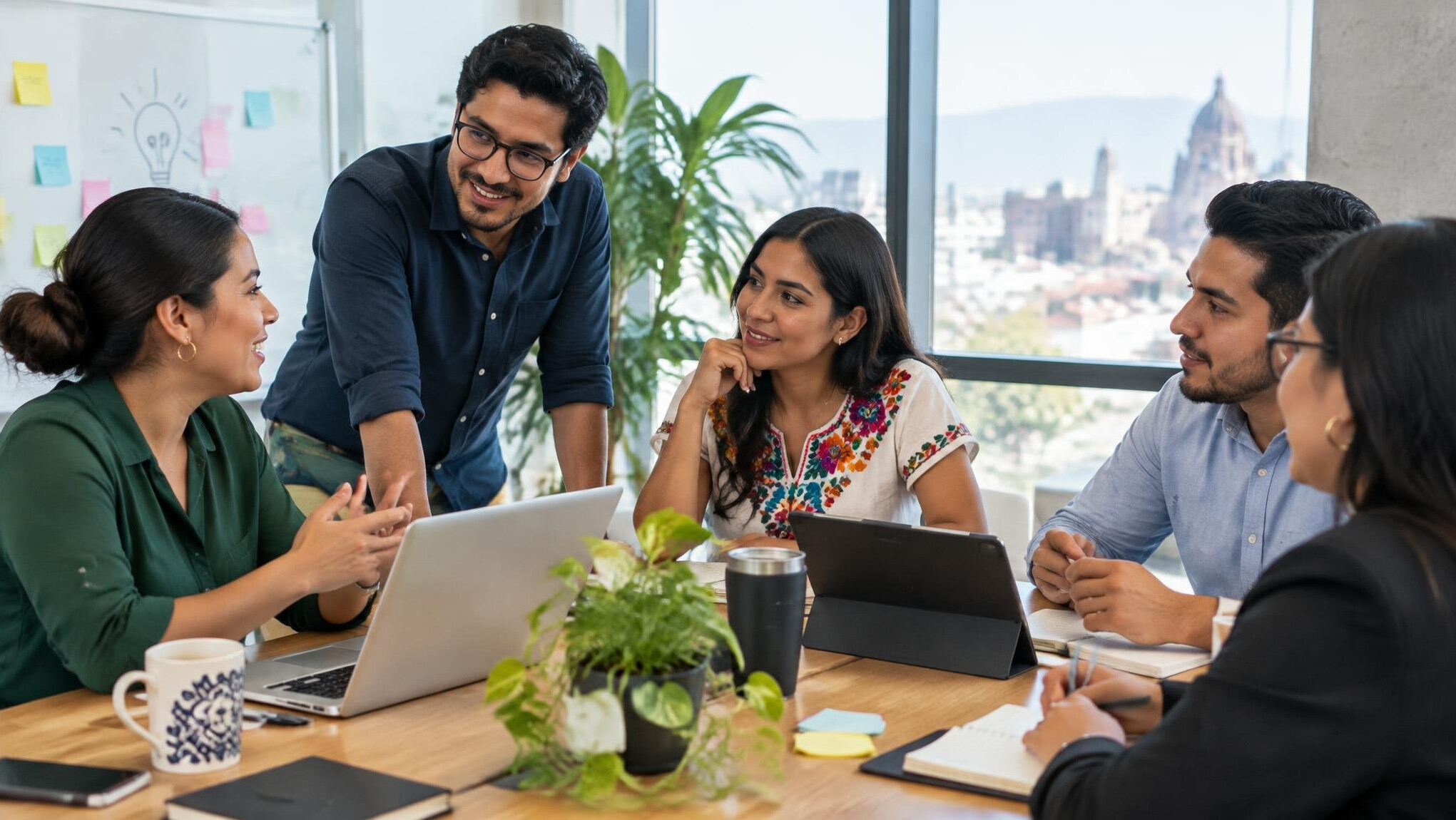 Team meeting with people sharing ideas in an office