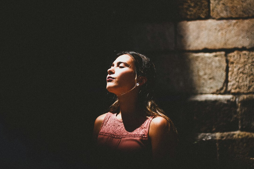 person doing breathing exercise